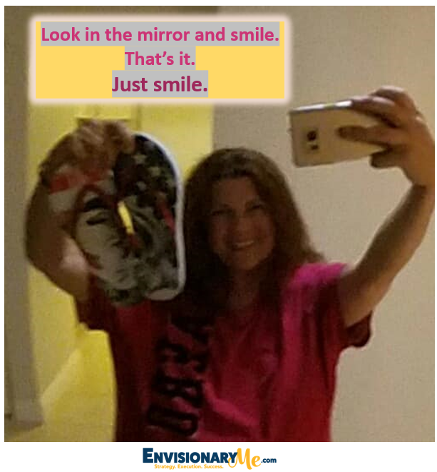 Original picture image of a beautiful young lady taking a selfie with the words "Look in the mirror and smile." 
