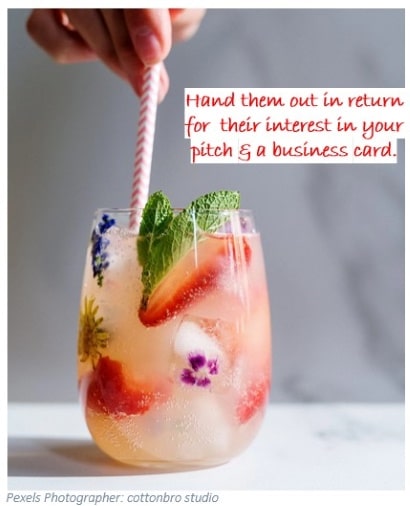 Summer drink image with words Hand them out in return for their interest in your pitch and a business card.