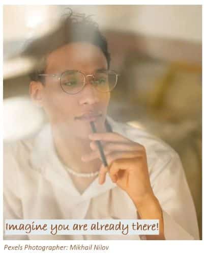Imagine you are already there text on image of young entrepreneur thinking