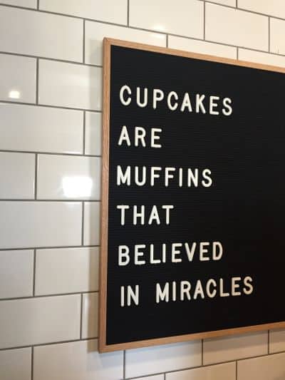 sign that reads Cupcakes Are Muffins That Believed in Miracles